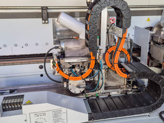Plaqueuses de chants unilaterales avec automatisation HOMAG + LIGMATECH KAL 310 + ZHR 05