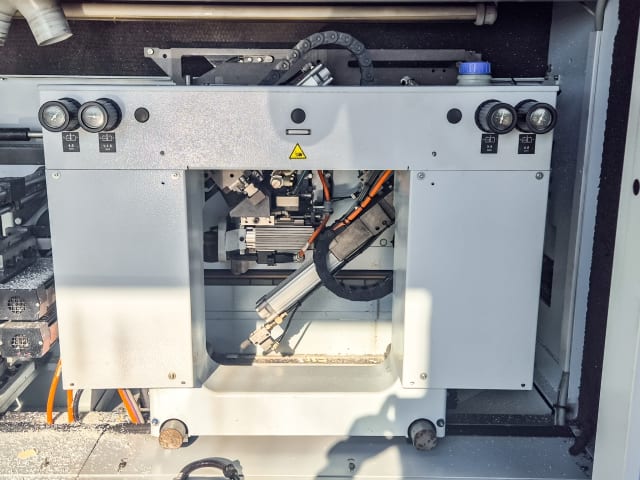 Plaqueuses de chants unilaterales avec automatisation HOMAG + LIGMATECH KAL 310 + ZHR 05