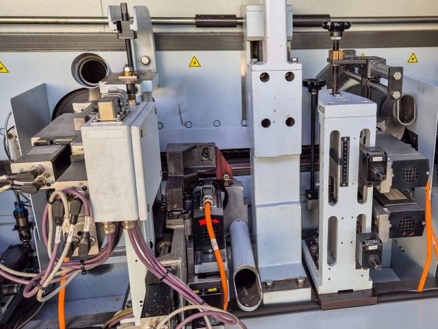 Plaqueuses de chants unilaterales avec automatisation HOMAG + LIGMATECH KAL 310 + ZHR 05